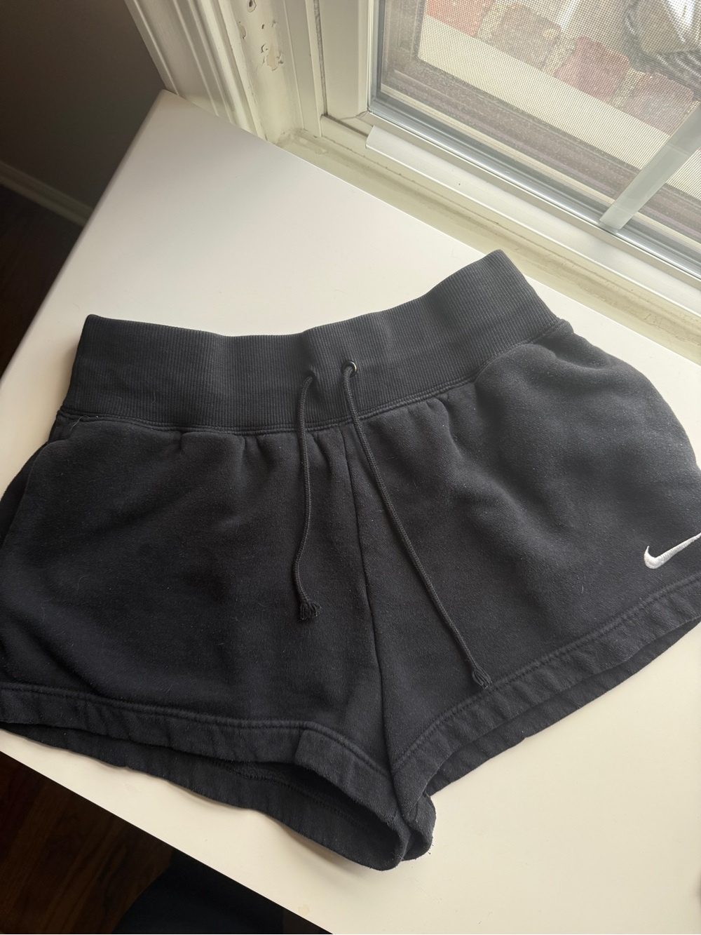 Nike Women's Black Athletic Shorts with Drawstring and Swoosh